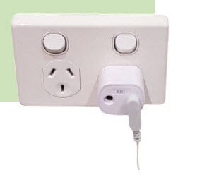 White power outlet with plug inserted