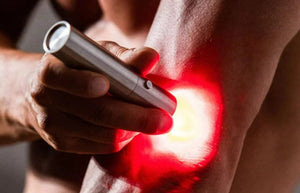 Red light therapy on elbow (BBL2228329)