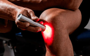Knee being treated with light therapy, BBL2228329