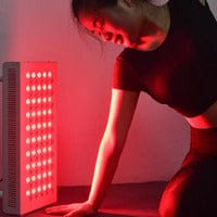 Red light therapy device and woman