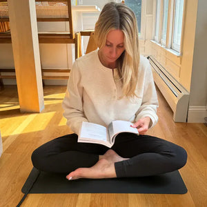 Woman on MATFL_2 reading book.