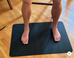 Man standing on a MATFL floor mat