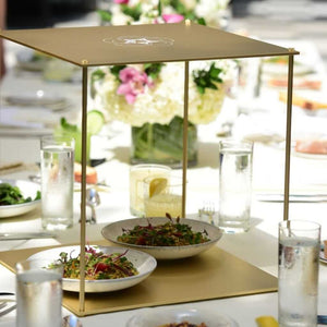 Super Quantum Bloc table setting with food