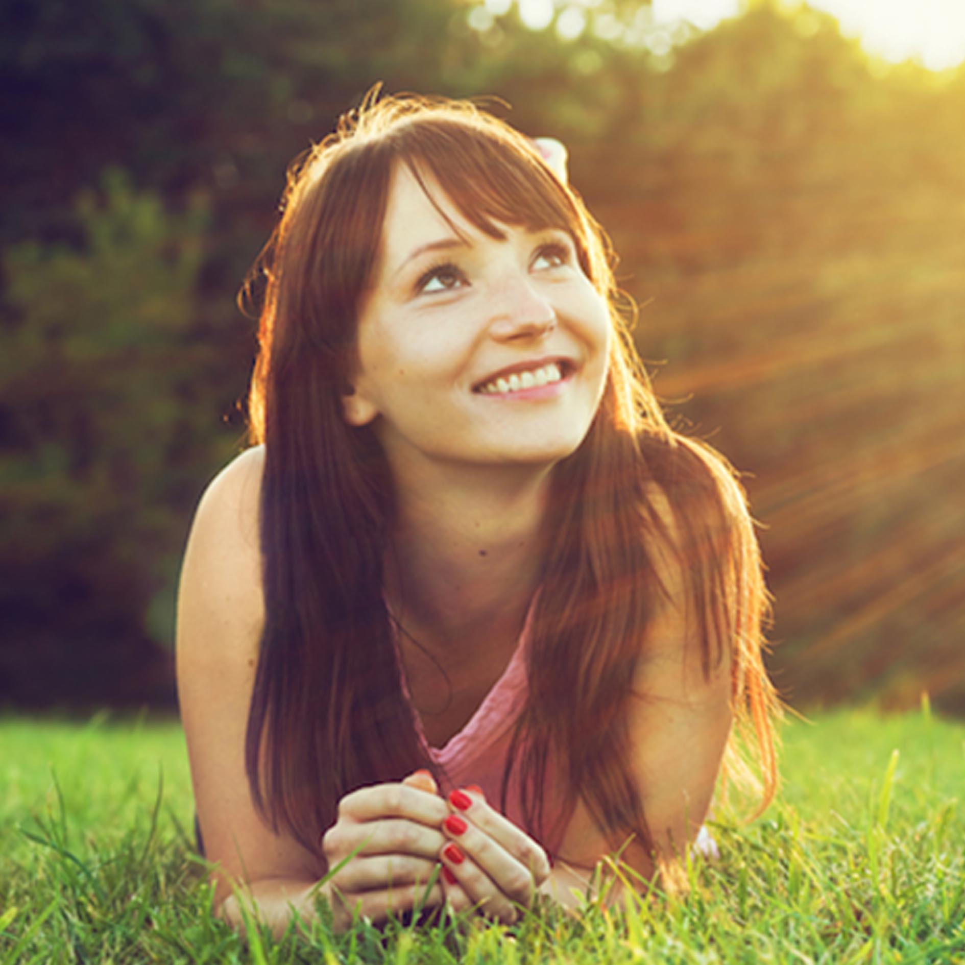 Happy Woman on Grass