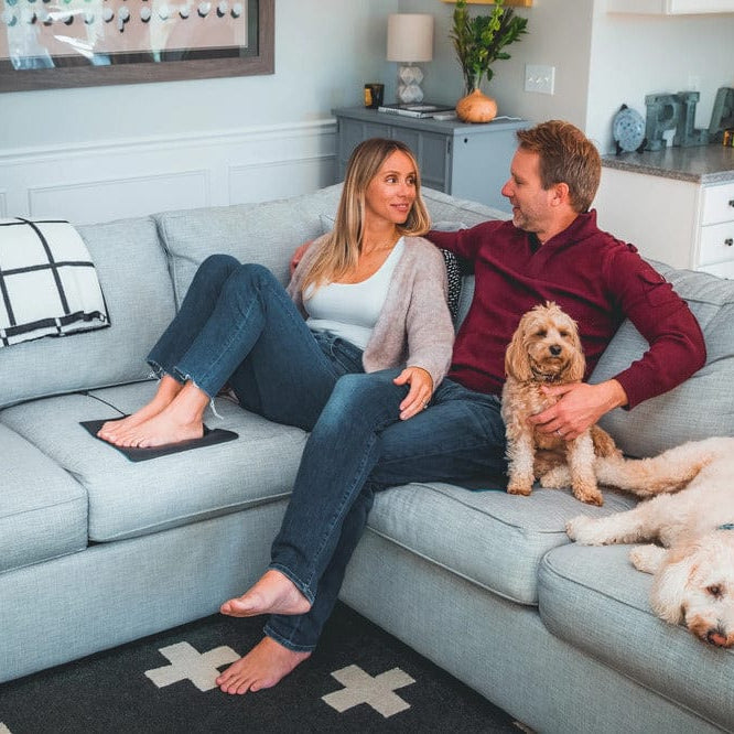 Couple on couch with dogs, MATO_54724f4b