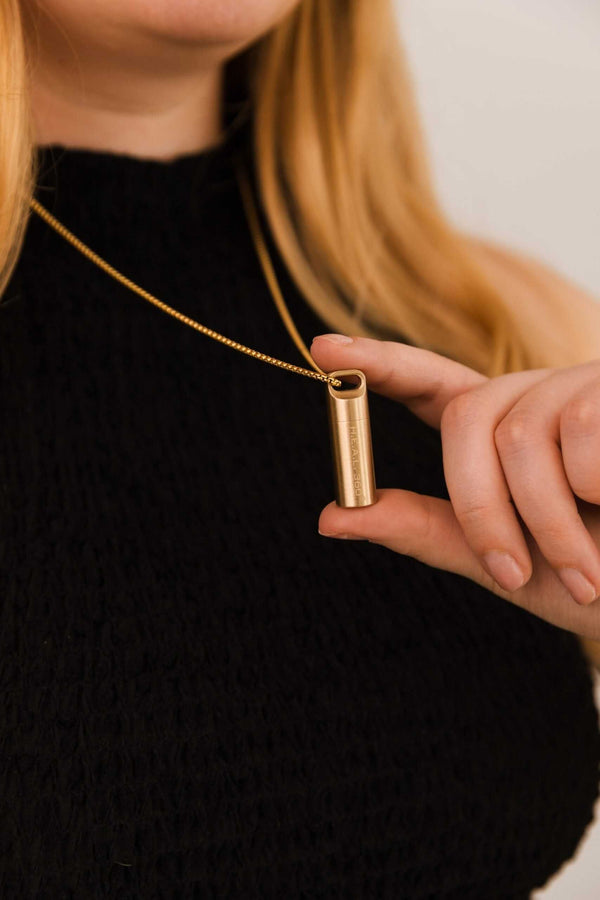 Petite gold heal capsule necklace